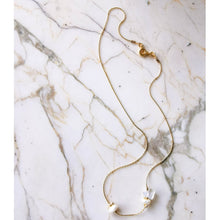 Load image into Gallery viewer, Full view of asymmetric opal necklace on marble table 
