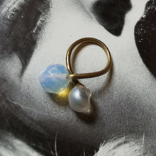 Load image into Gallery viewer, Opal and button style ring on magazine