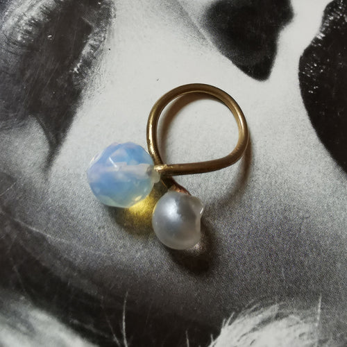 Opal and button style ring on magazine