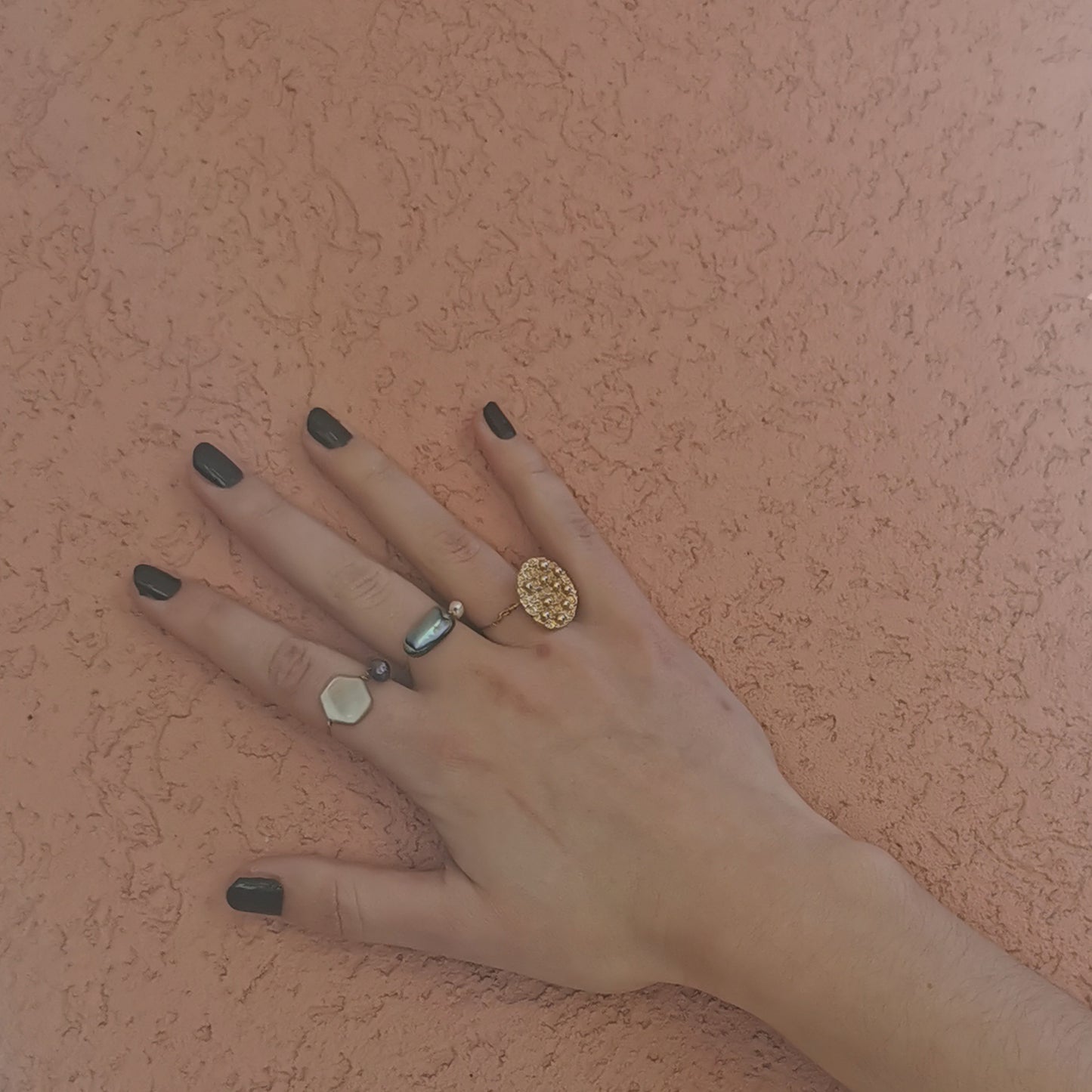 Paua shell and freshwater pearl ring worn on