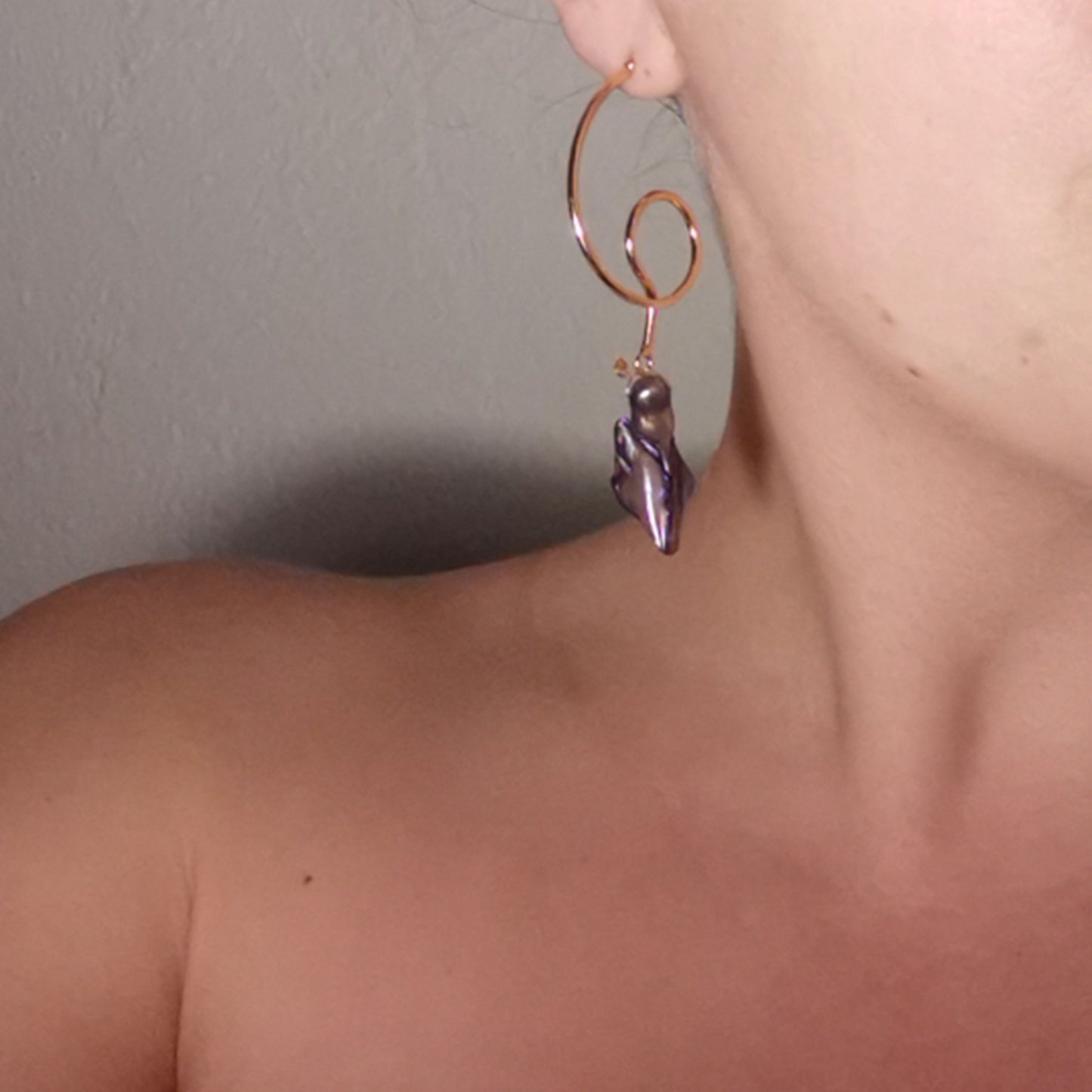 Blue Christmas earrings worn on