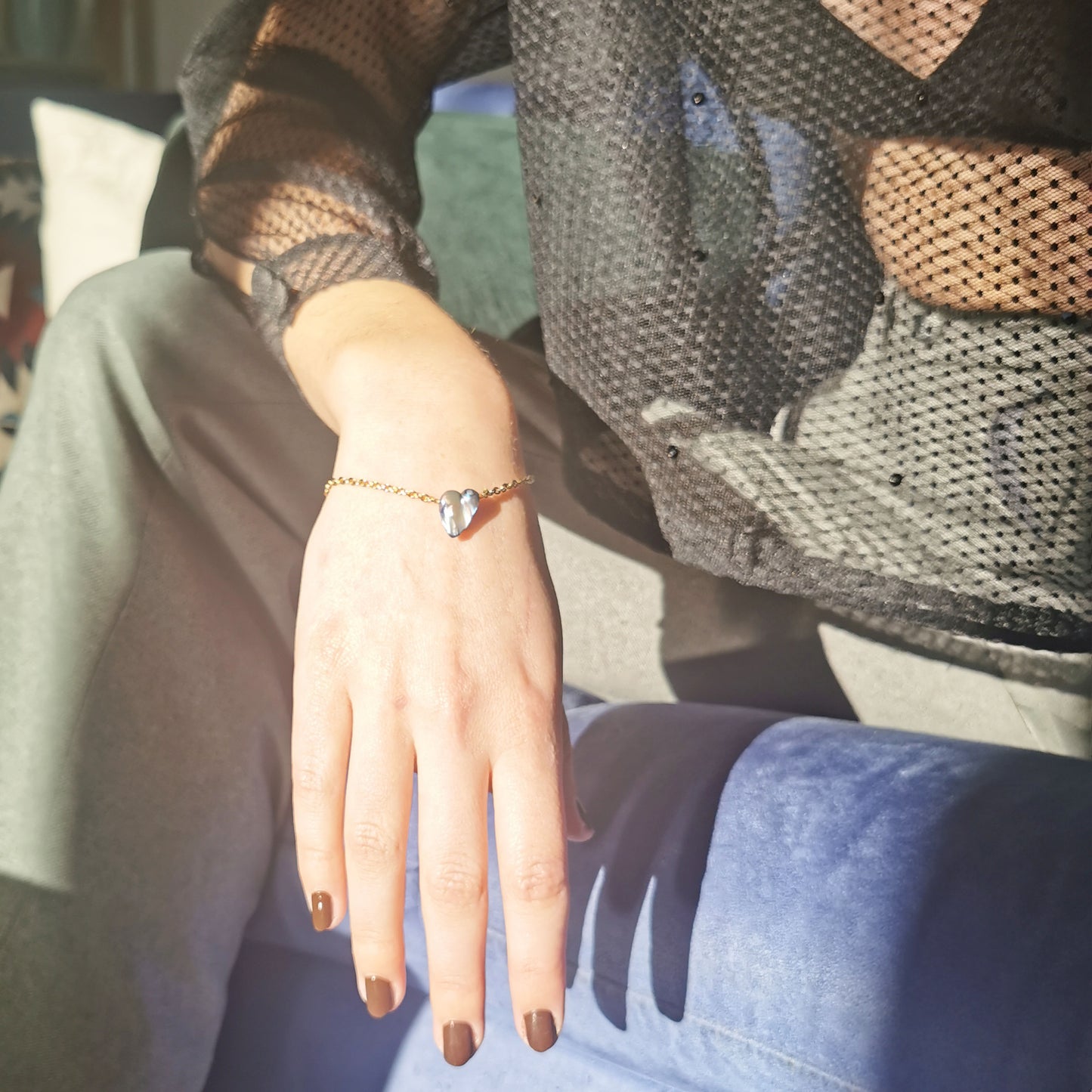 Blue kishi bracelet worn on