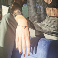 Load image into Gallery viewer, Blue kishi bracelet worn on