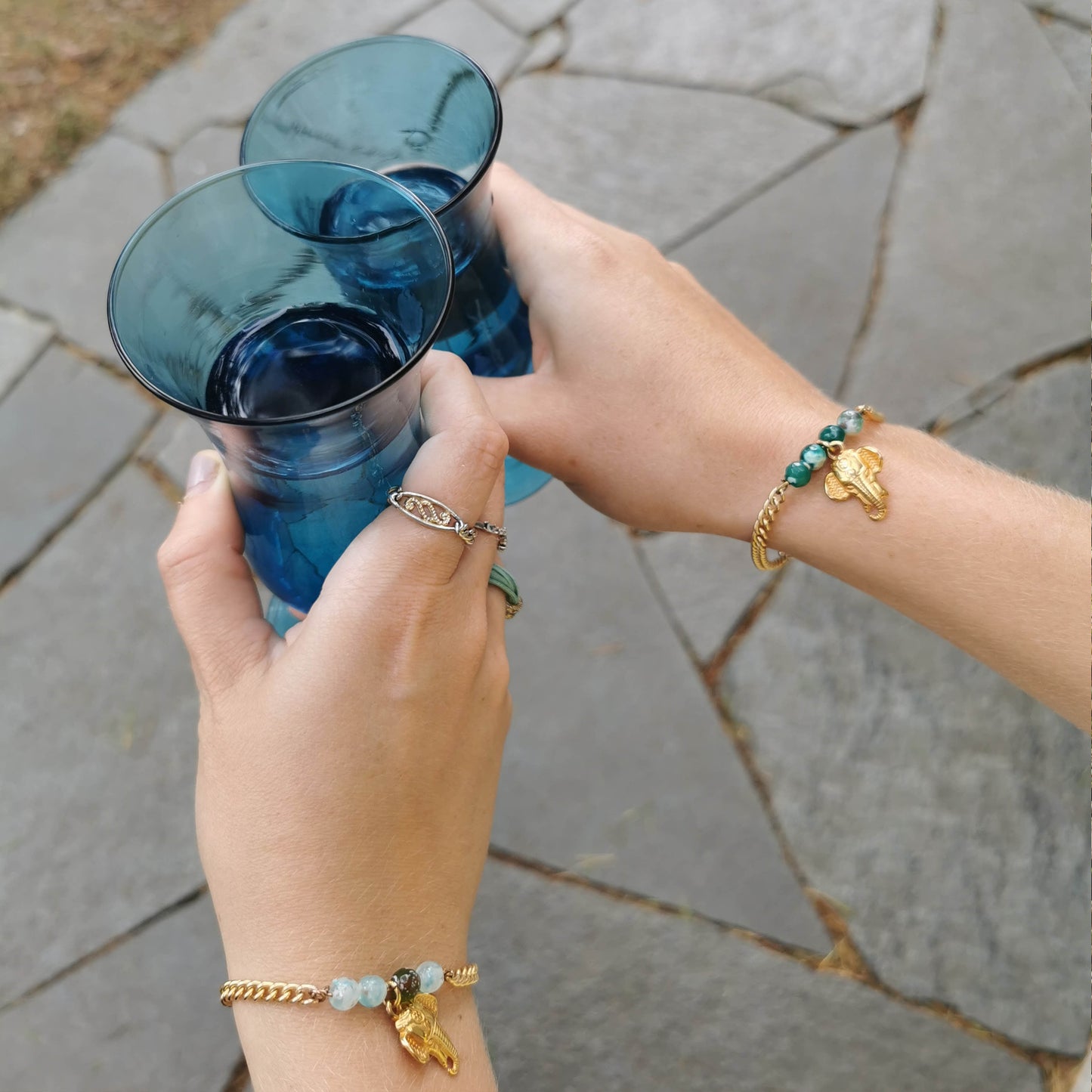 Elephant charm bracelets worn on