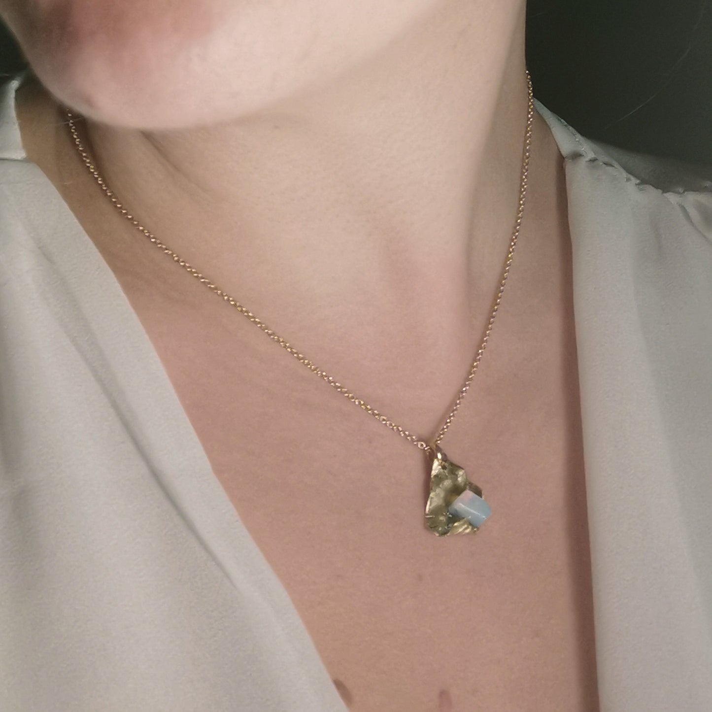 Fortune cookie necklace worn on