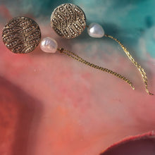 Load image into Gallery viewer, Waved stud earring with freshwater pearl drop and chain on Camifolla classic background