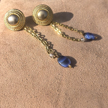 Load image into Gallery viewer, Textured stud with cable chain dangle and blue and see-through beads on suede background