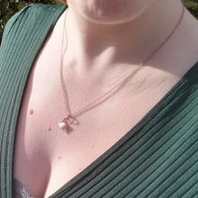 Load image into Gallery viewer, Copper rose gold necklace worn on