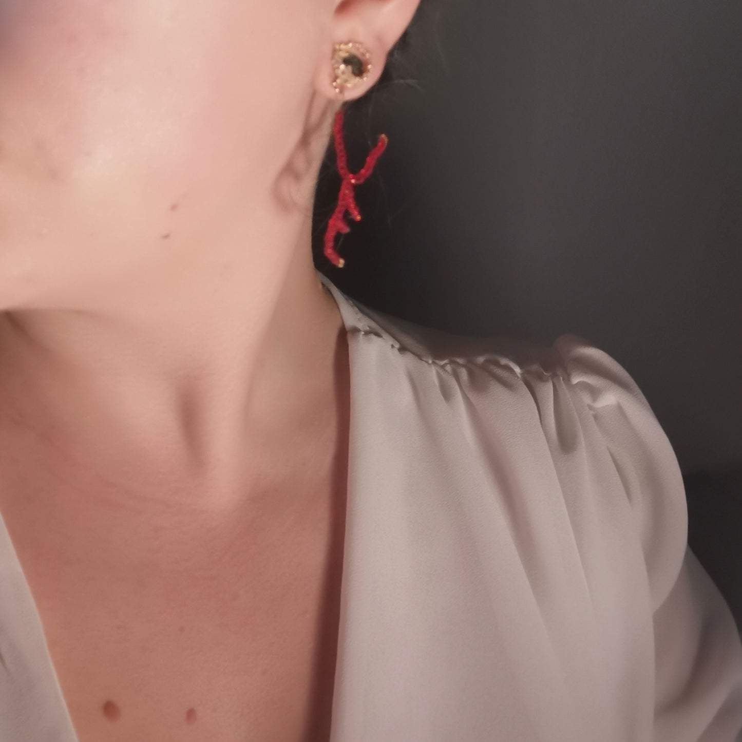 LOVE earrings worn on