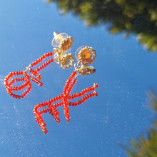 Load image into Gallery viewer, Love earrings photographed in mirror