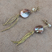 Load image into Gallery viewer, Tassle earrings with orange keshi and freshwater pearls details.