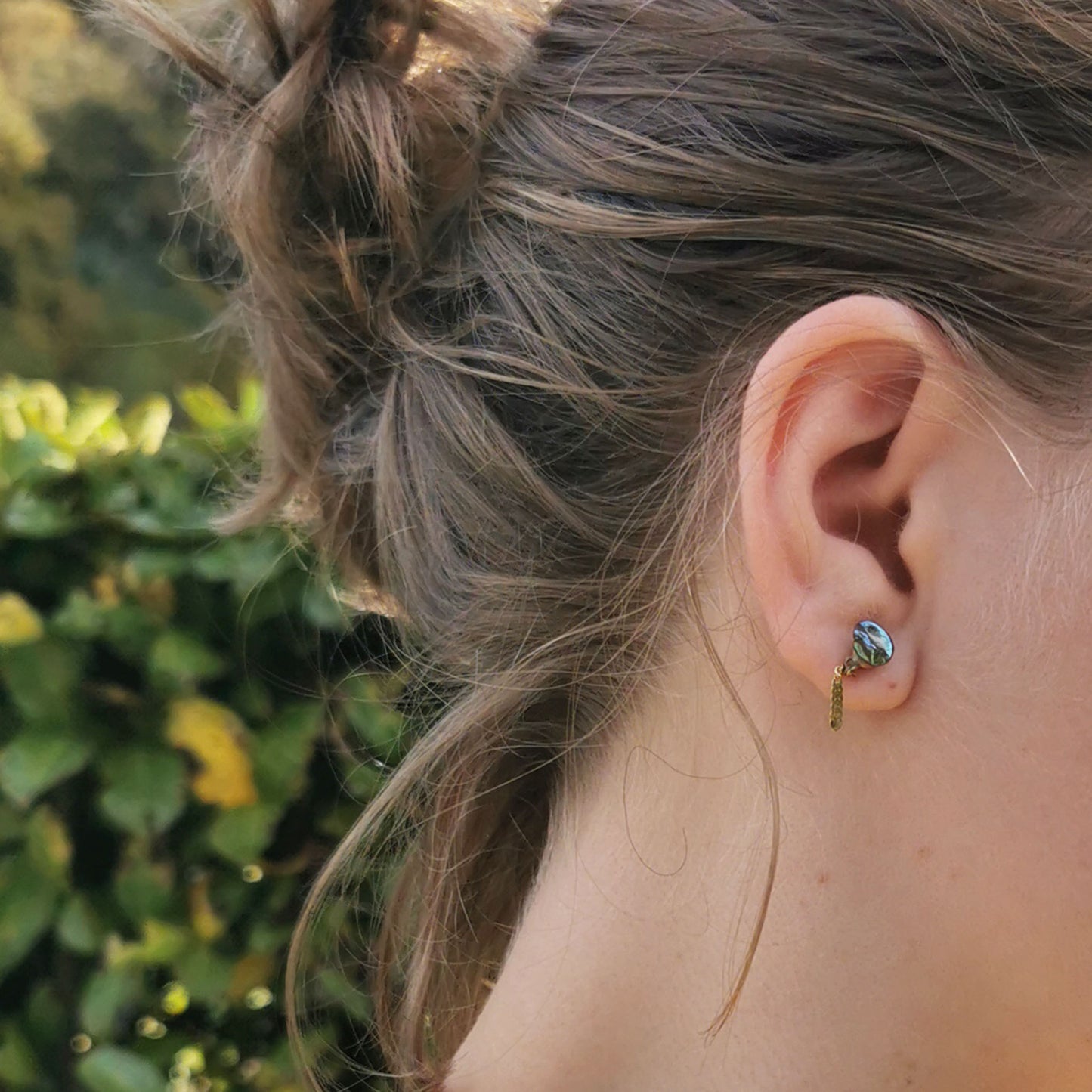 Pistachio mini lantern earrings worn on