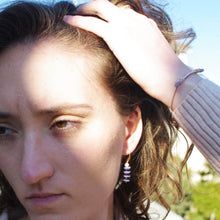 Load image into Gallery viewer, Camifolla purple rain bracelet worn on