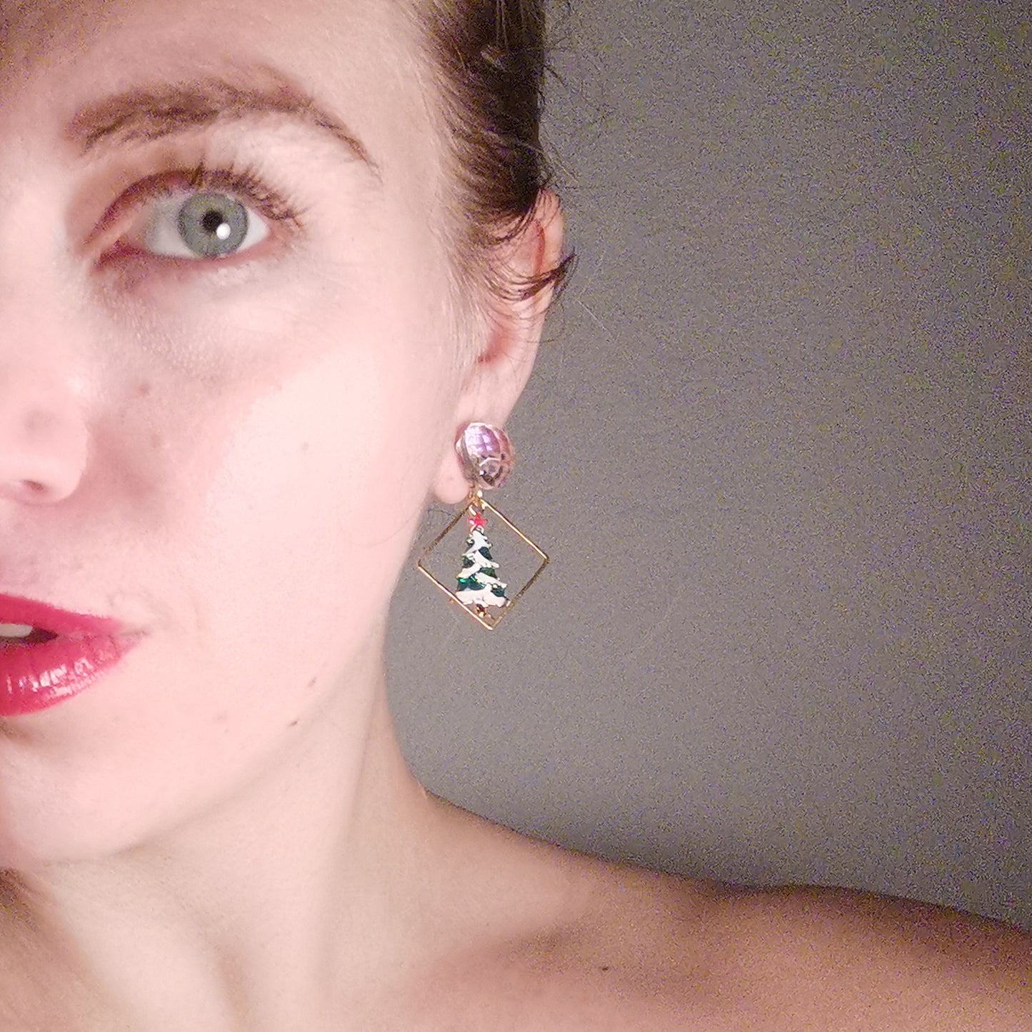 Snowglobe Christmas Tree earrings worn on