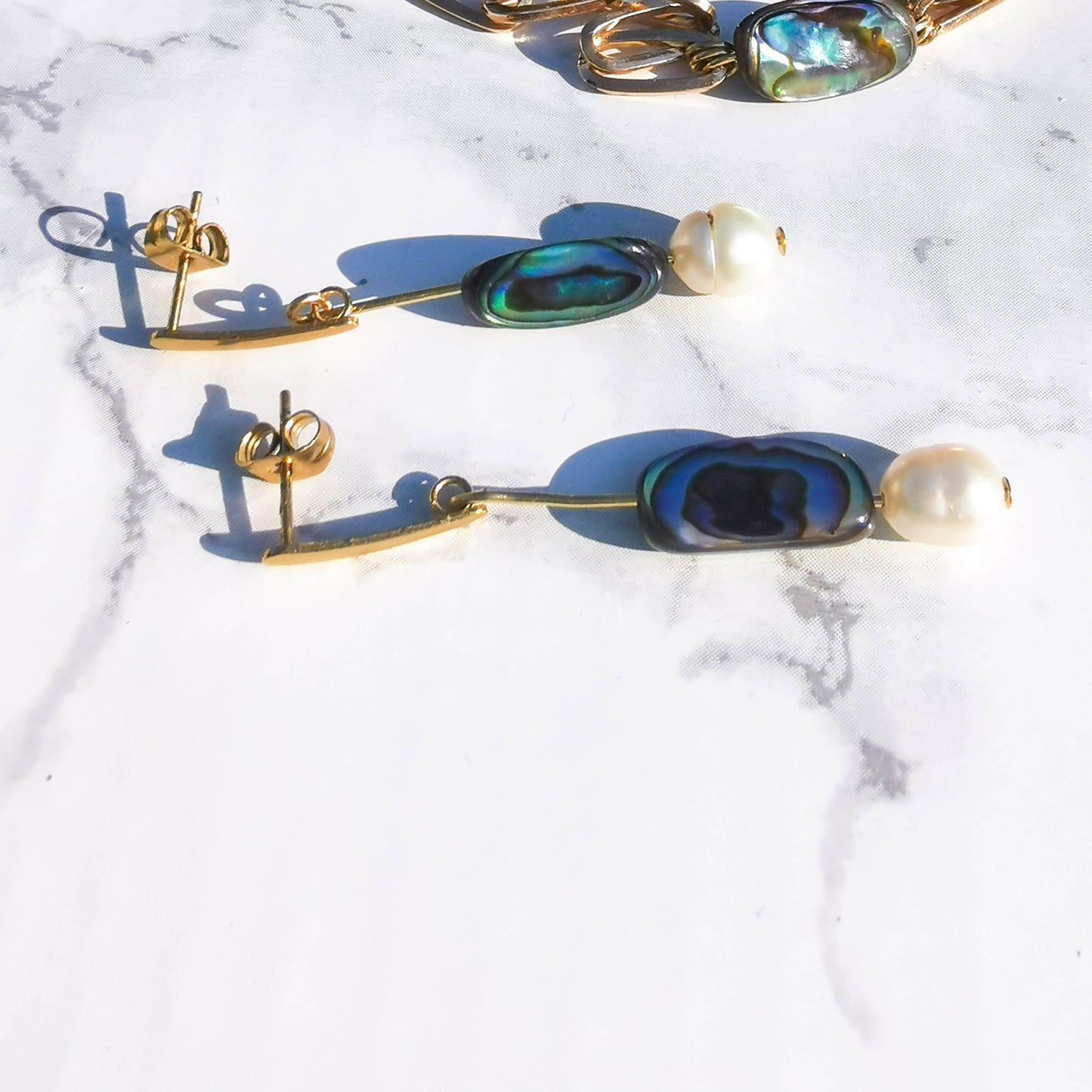 Pearl and abalone earrings