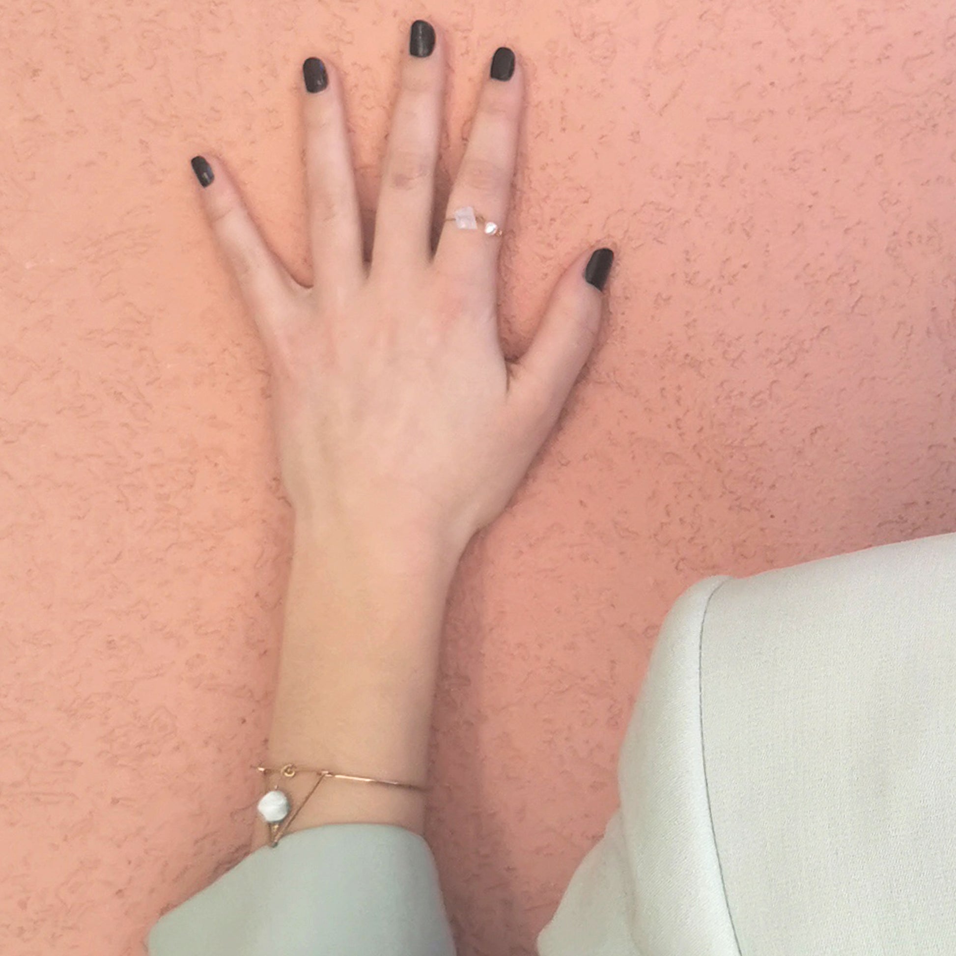 Barely there Opal and Freshwater ring worn on