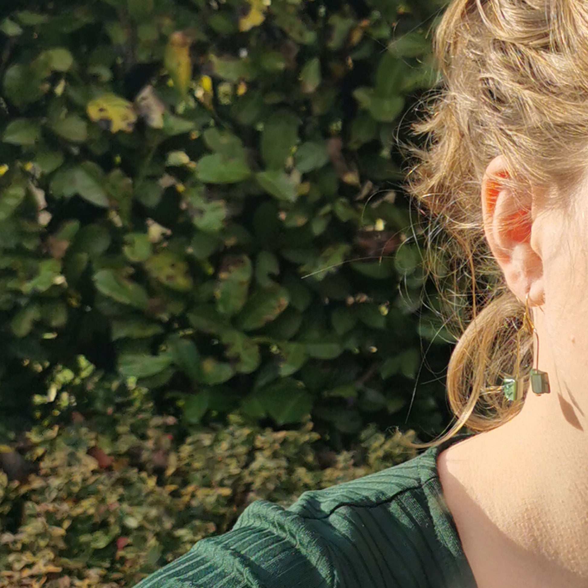 Cactus shell earrings worn on from different angle