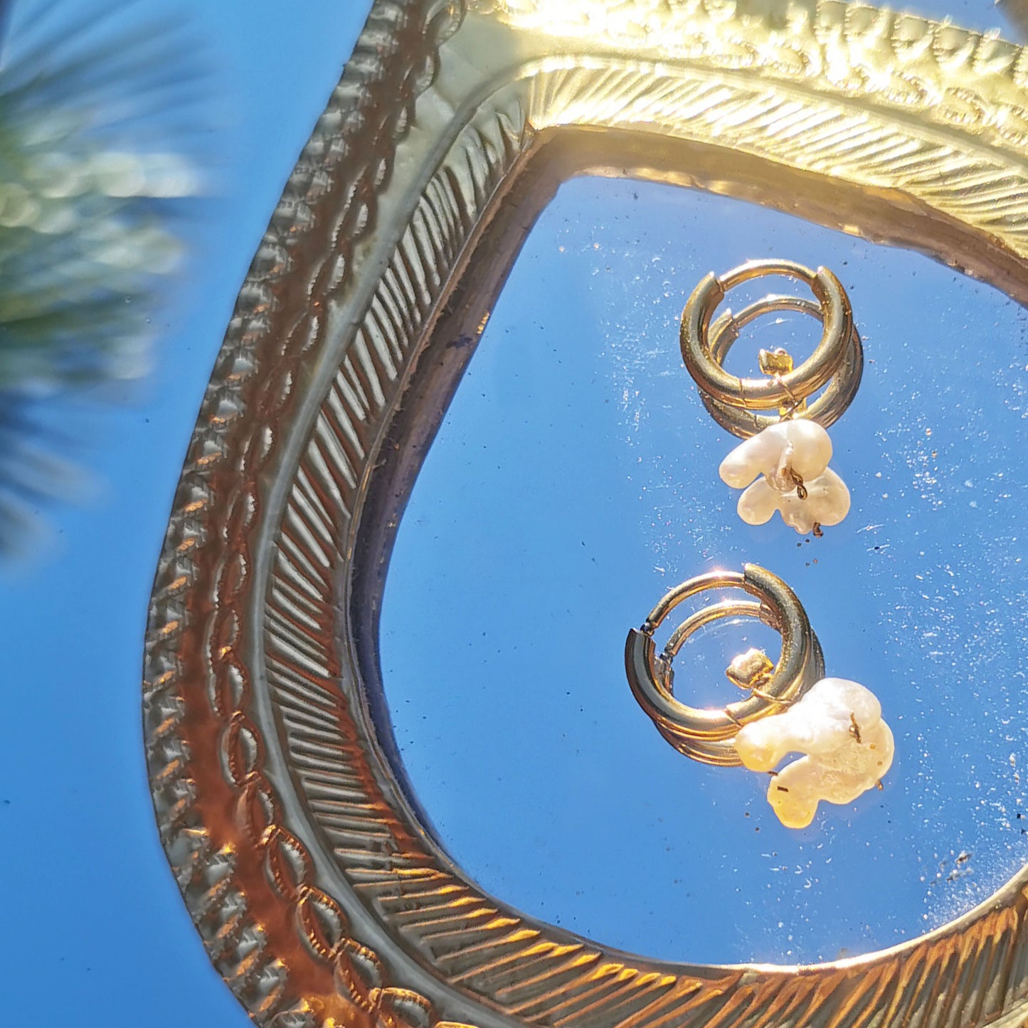 Freshwater pearl cloud shaped earring on small creole ring mirror