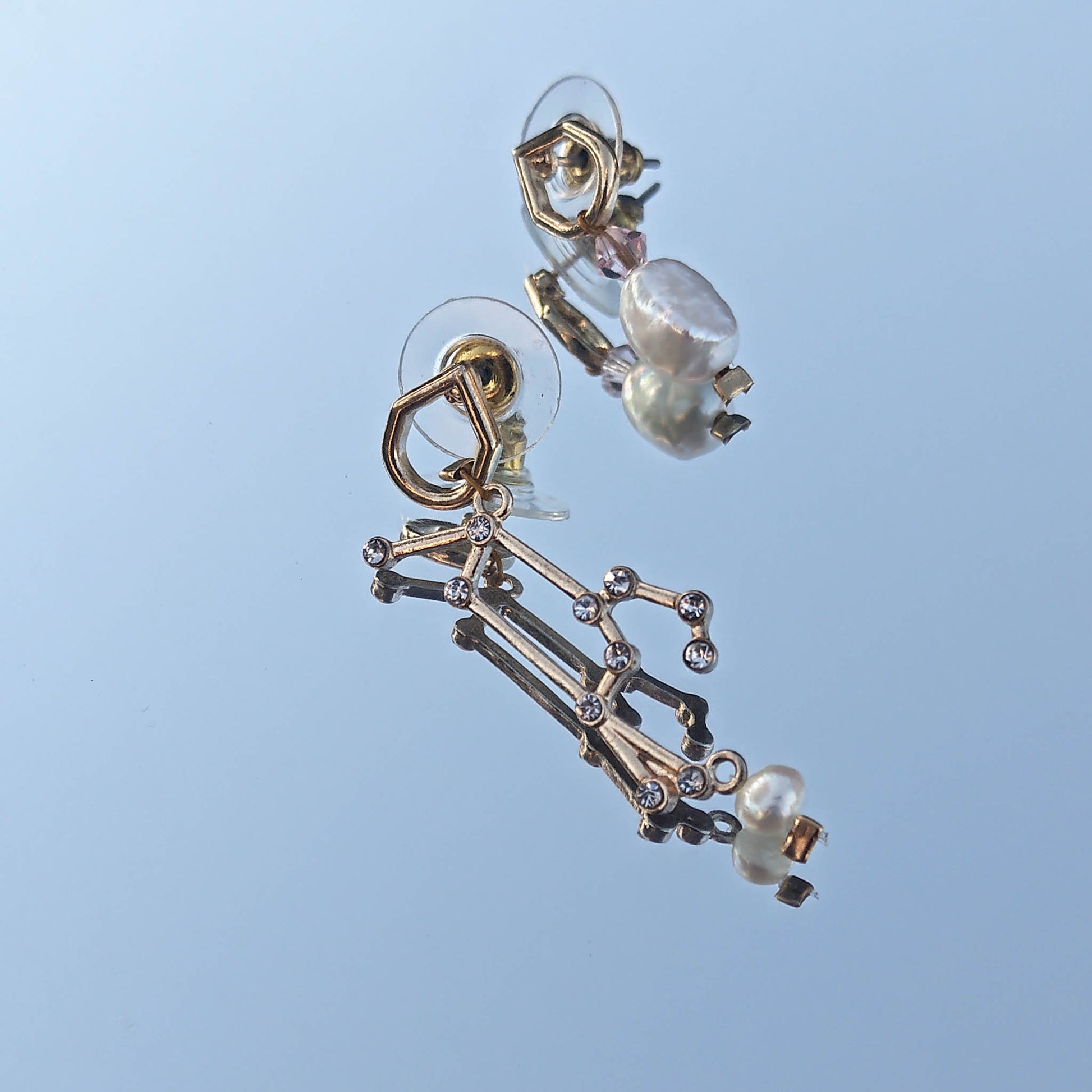 Mismatch Earrings with stellar sign freshwater pearls and swarowski crystals