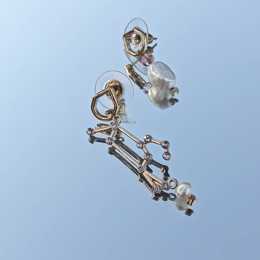 Mismatch Earrings with stellar sign freshwater pearls and swarowski crystals