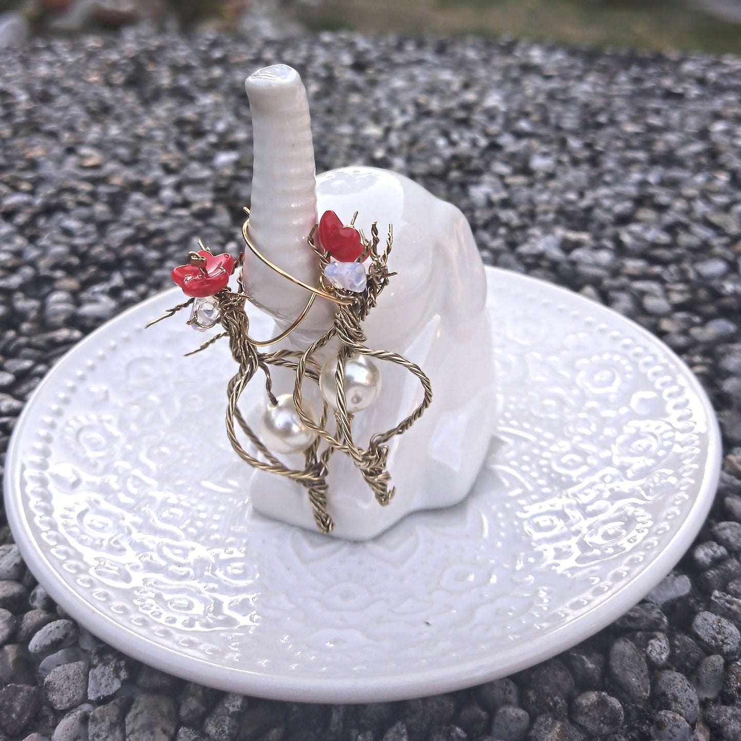 Dimbo the elephant  with twisted wire earrings set on a  hoop.