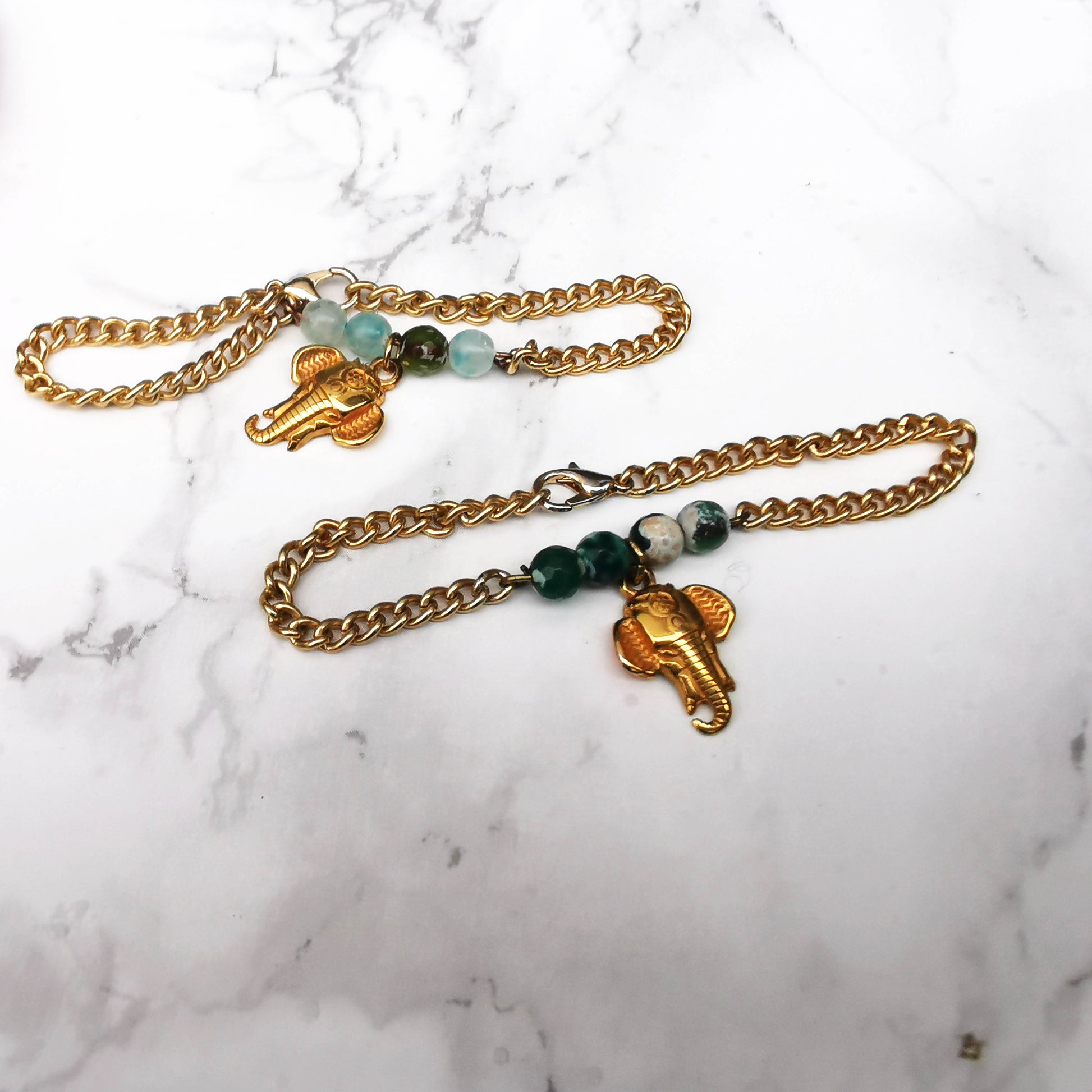 Elephant bracelets on marble background 