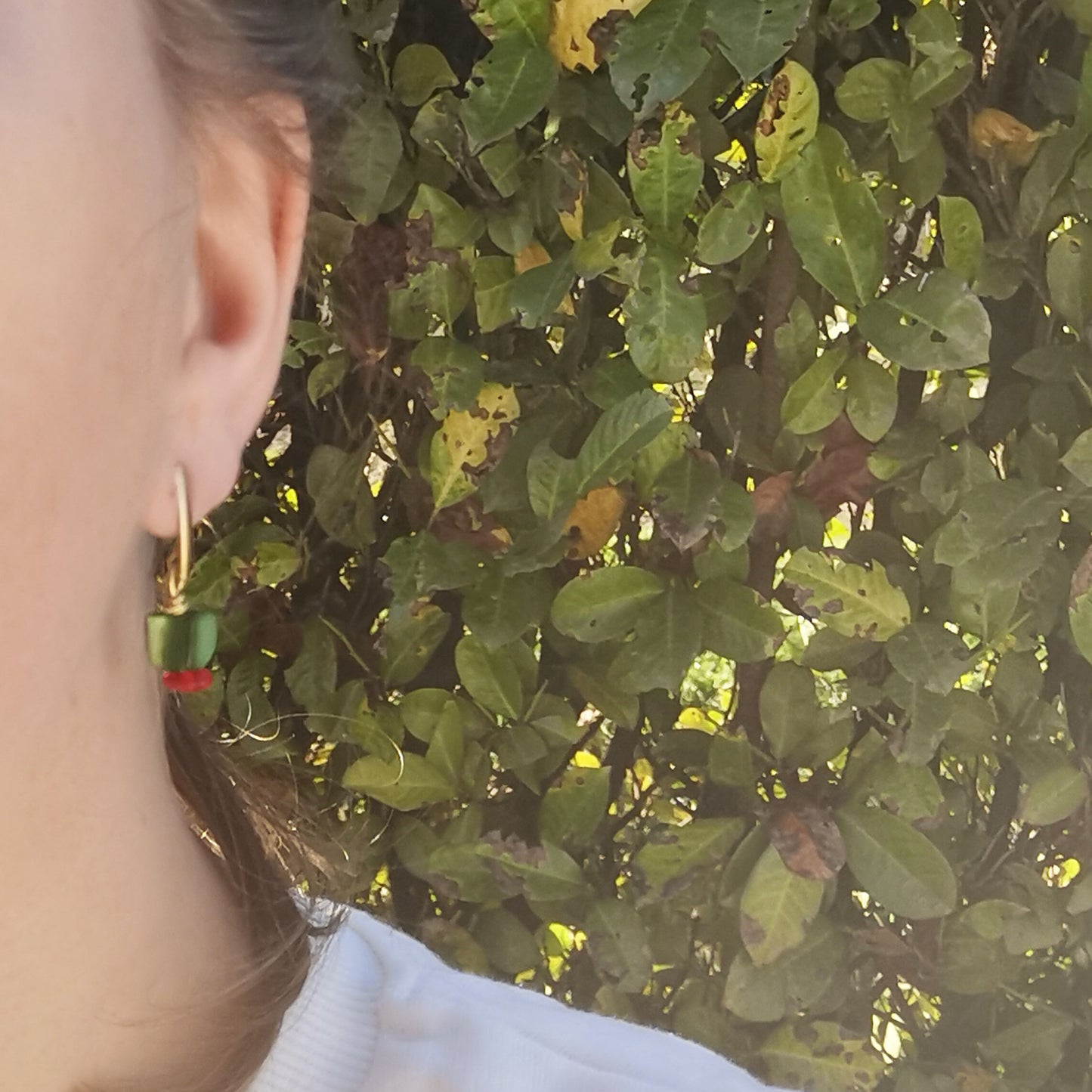 Elf earrings worn on 