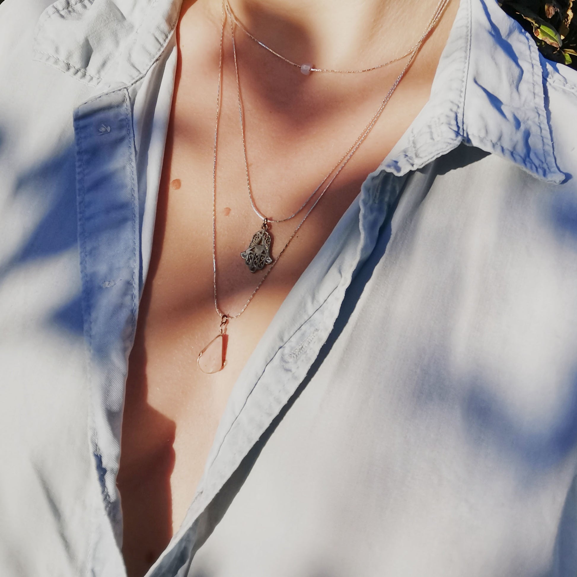 Fatima hand necklace worn on 