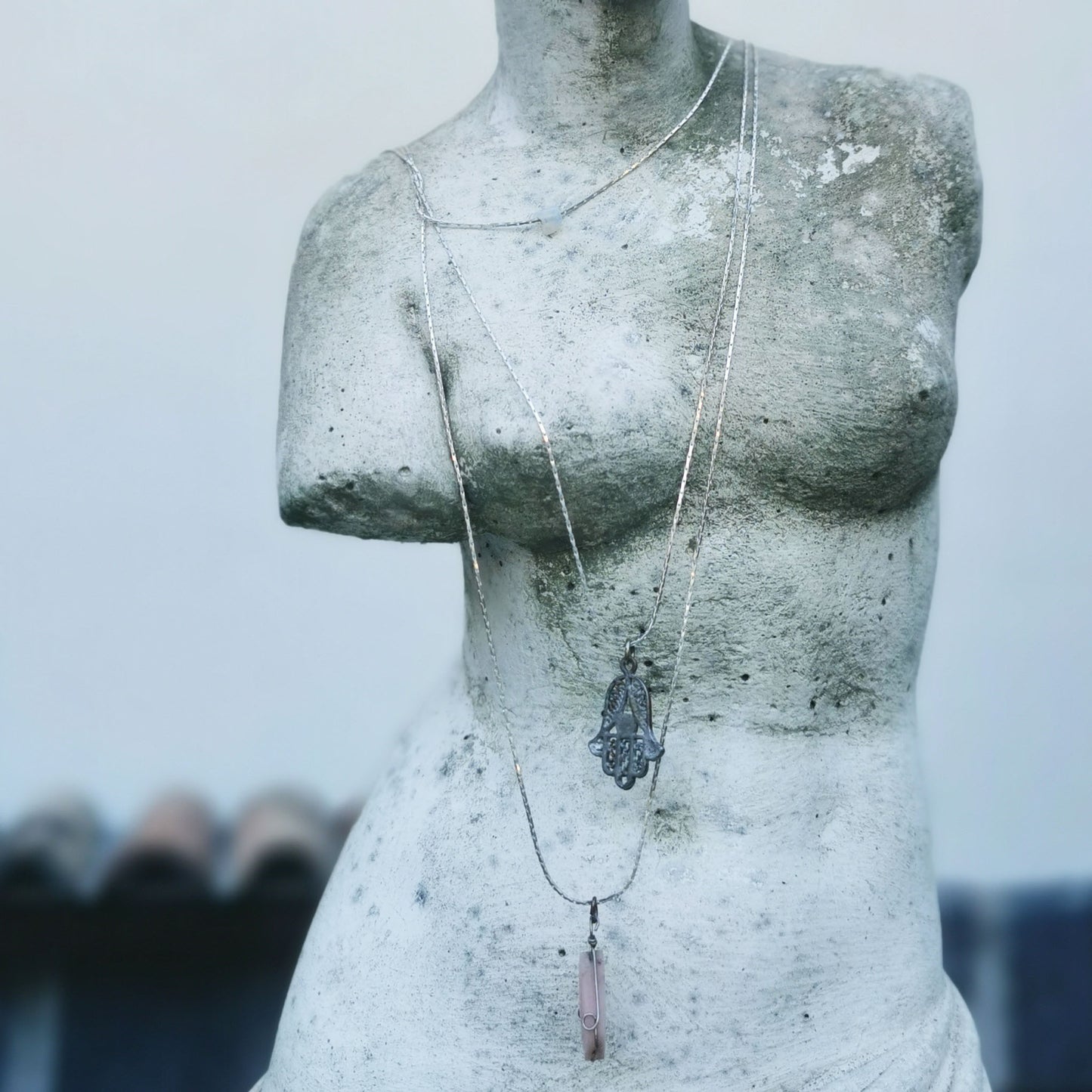 Fatima Hand Necklace on Venus statue
