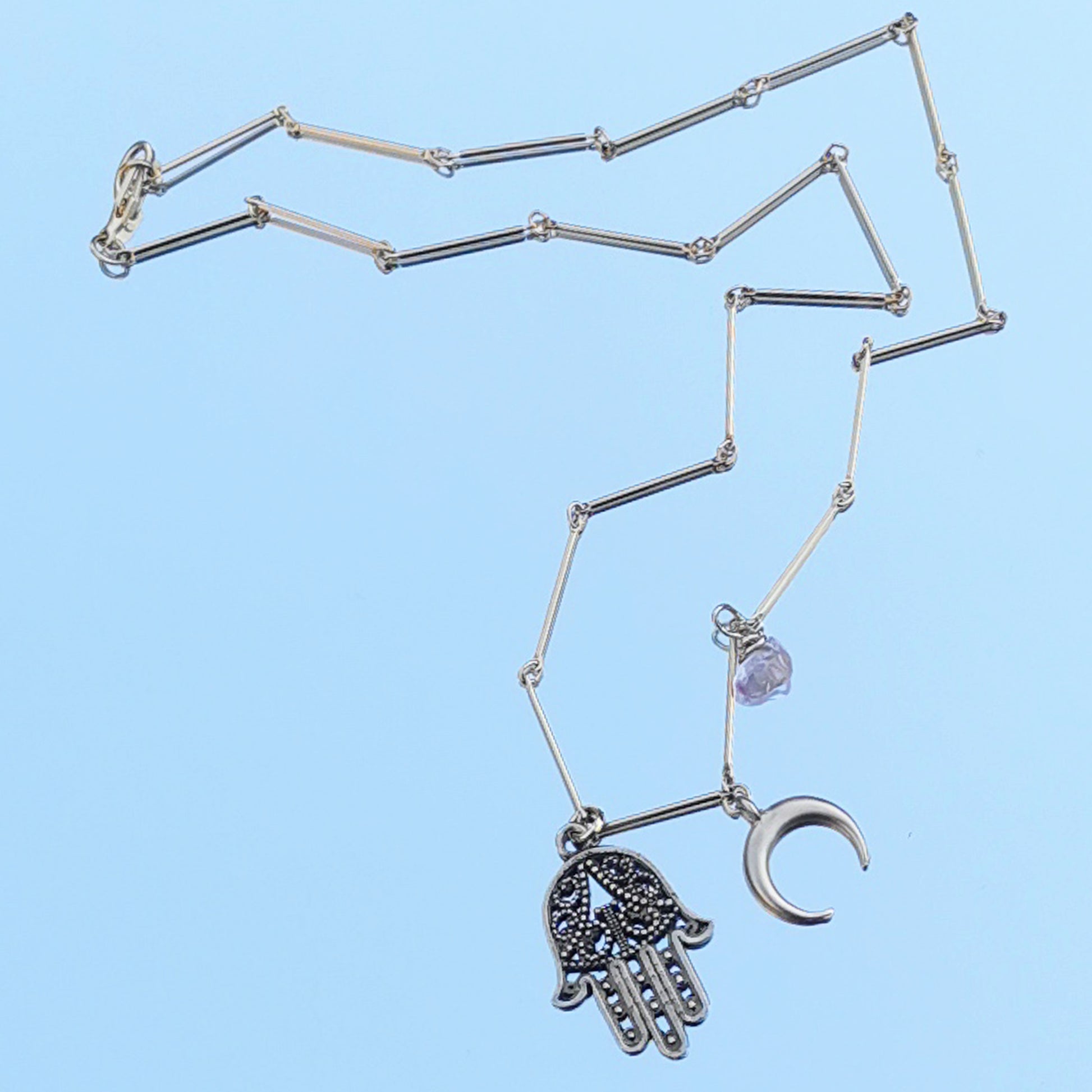 Fatima half moon rose quartz necklace