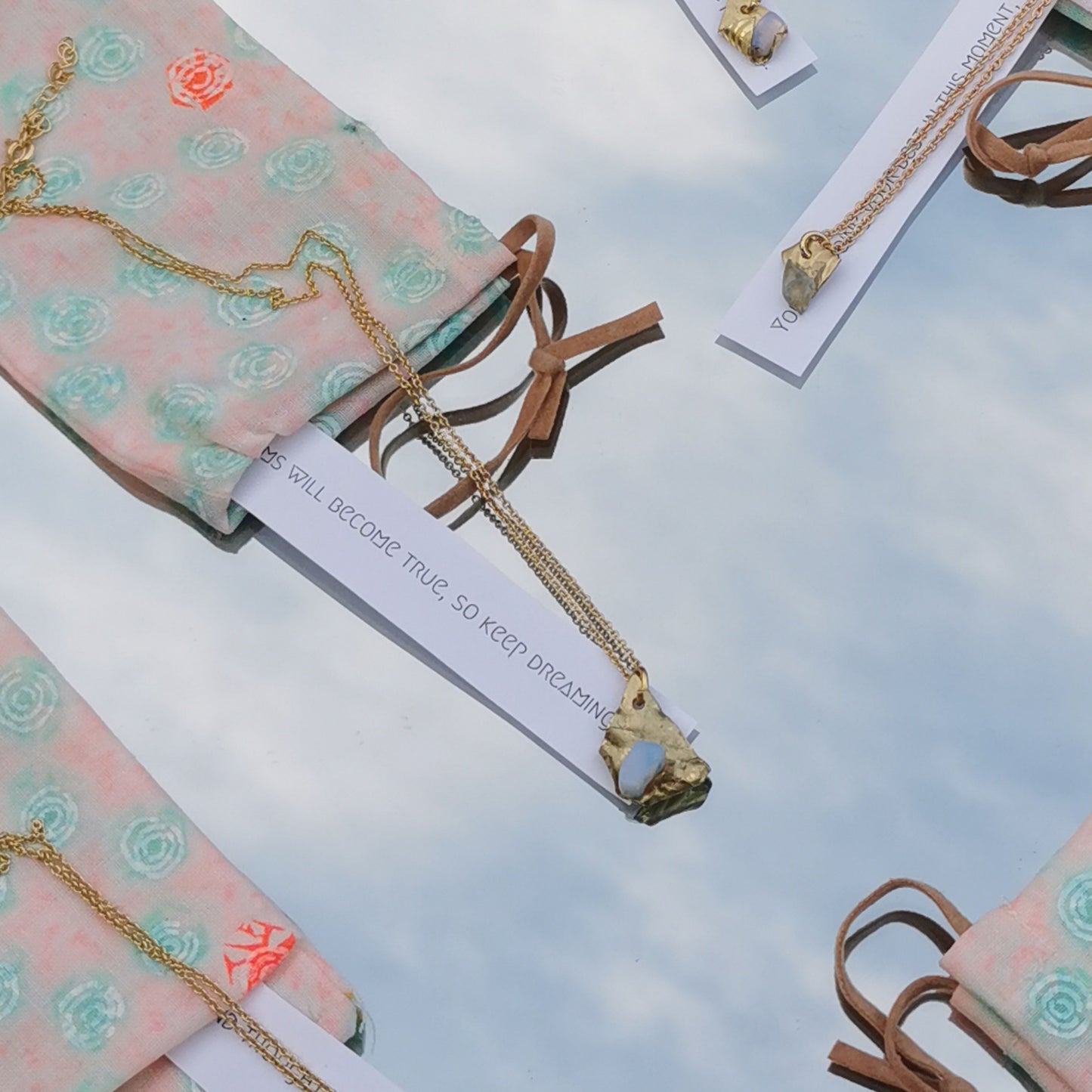 Opal and brass pendant with fortune cookie message