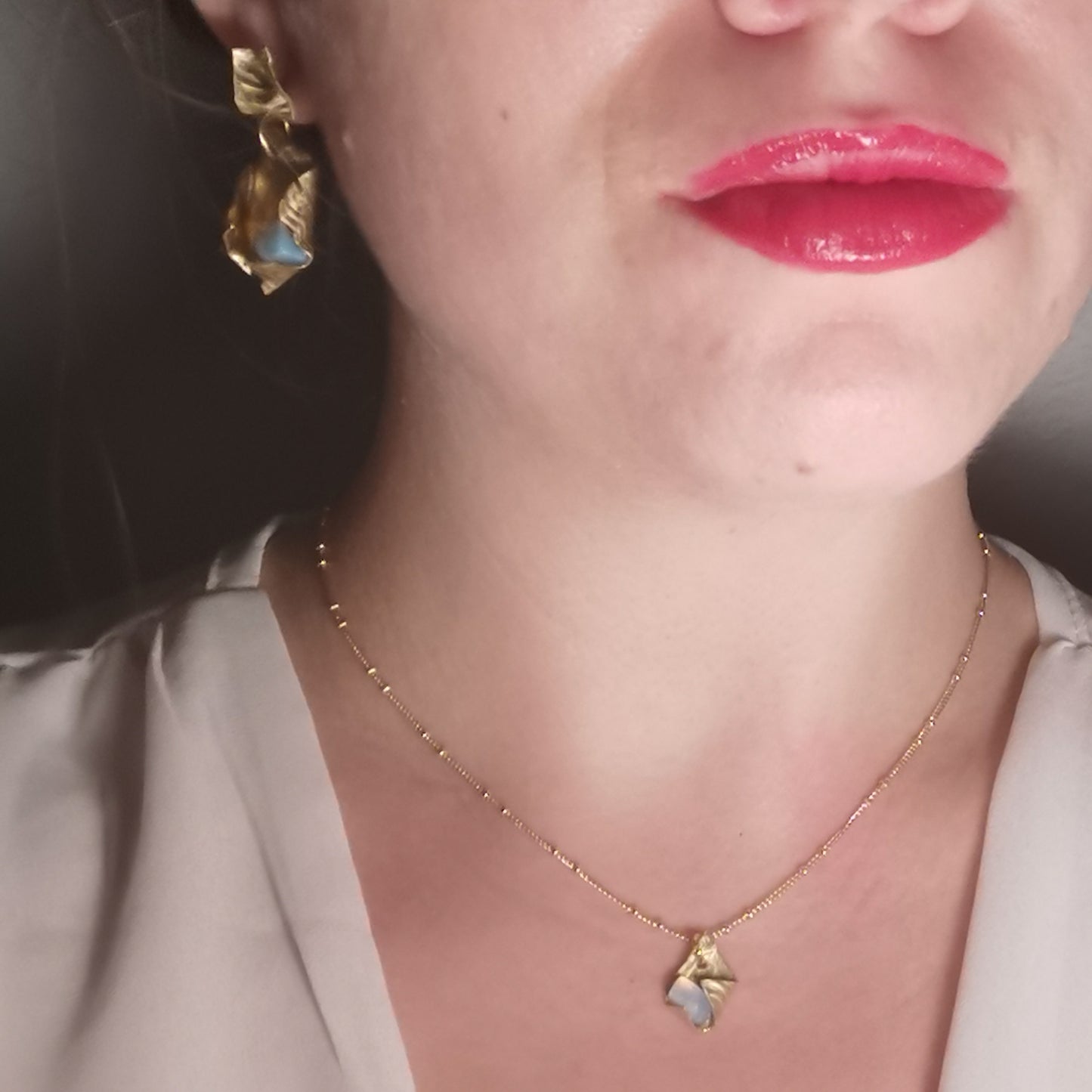 Opal and brass fortune cookie nr 5 necklace worn on with matching earrings