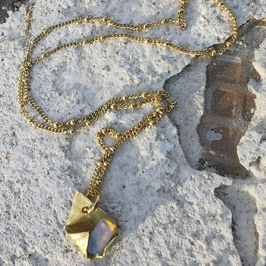 Brass and opal charm  