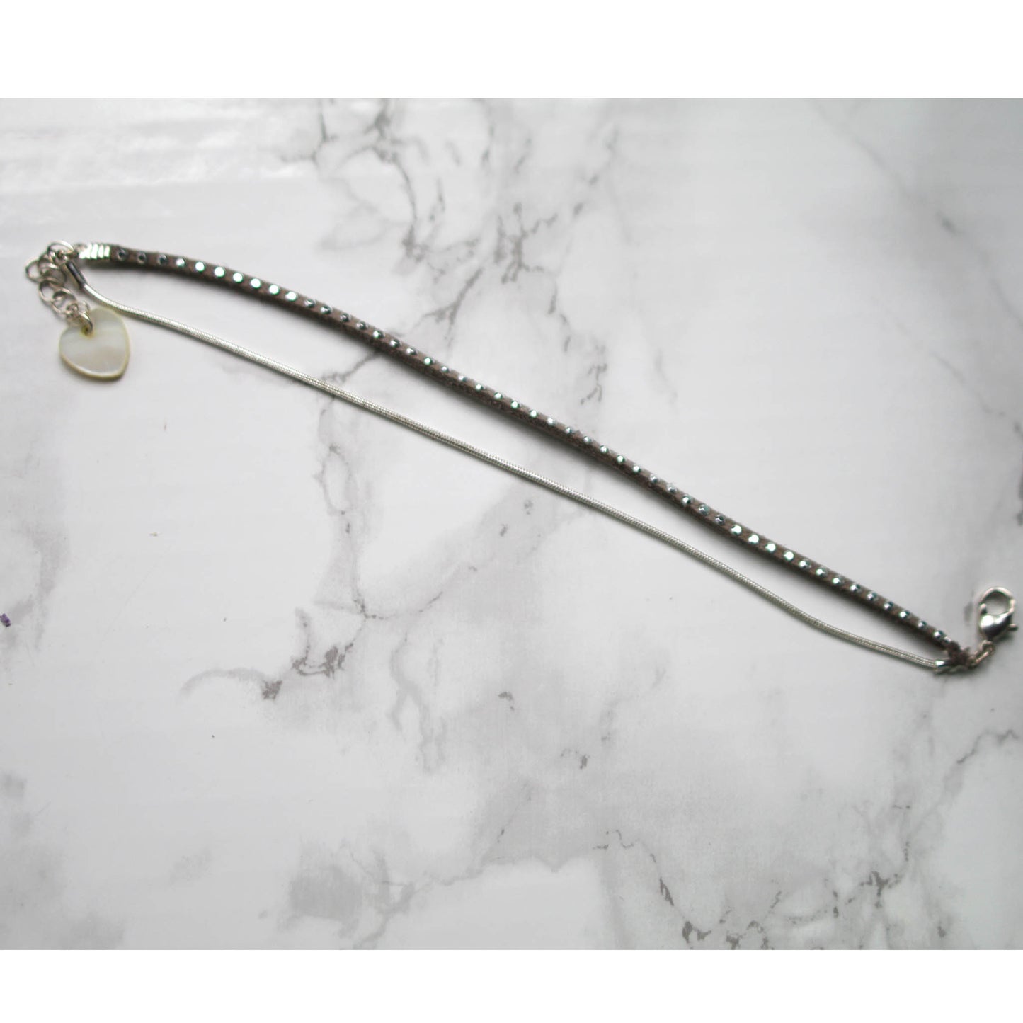 Heart on your sleeve Bracelet Marble background