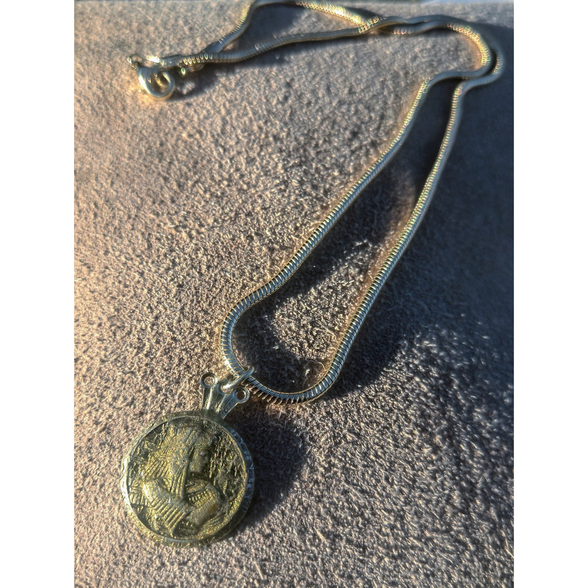 Camifolla Egyptian Cobra Necklace suede background