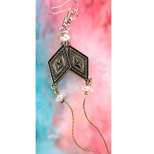 Kite earrings Camifolla background