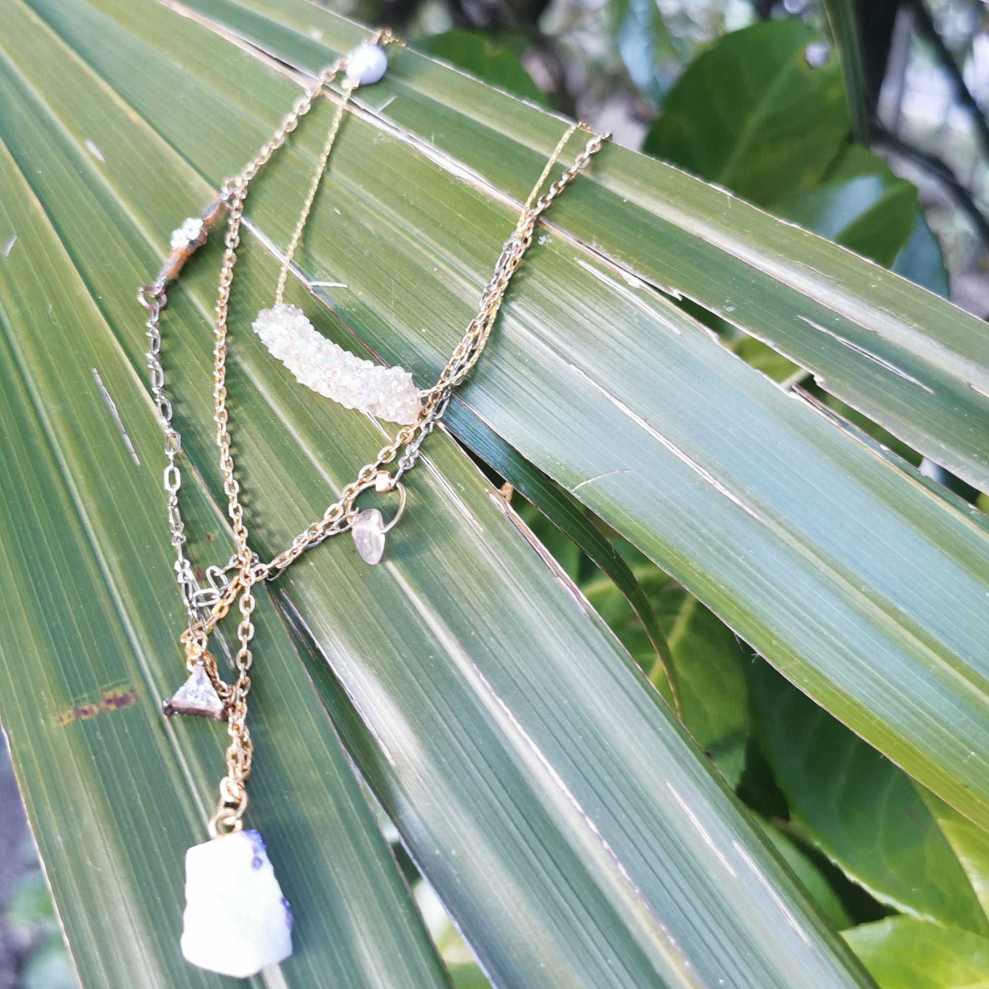 Aimee layered necklace on leaf