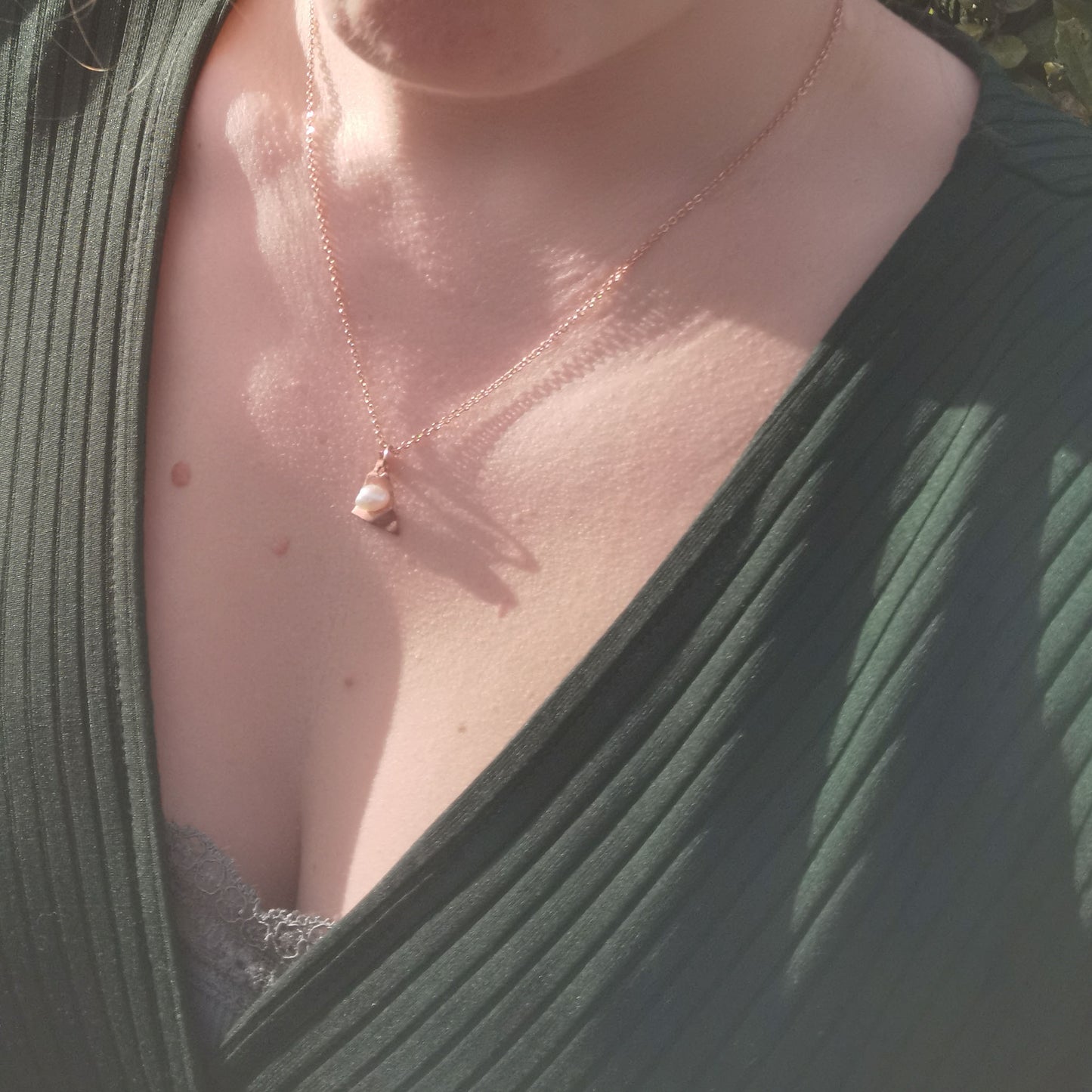 Copper and Pearl necklace worn on (rose gold plated)