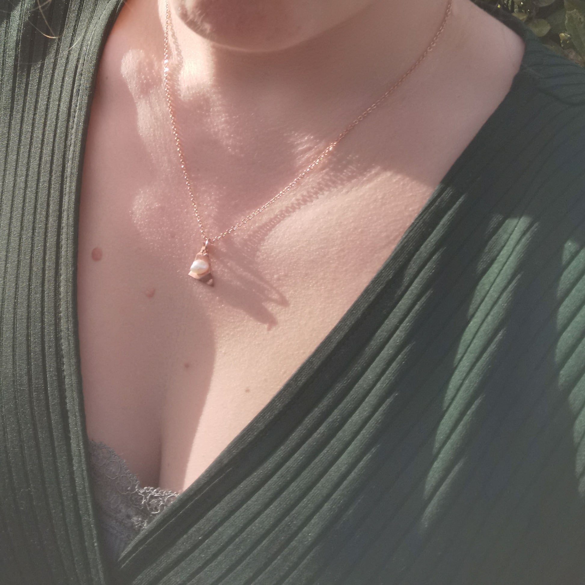 Copper and Pearl necklace worn on (rose gold plated)
