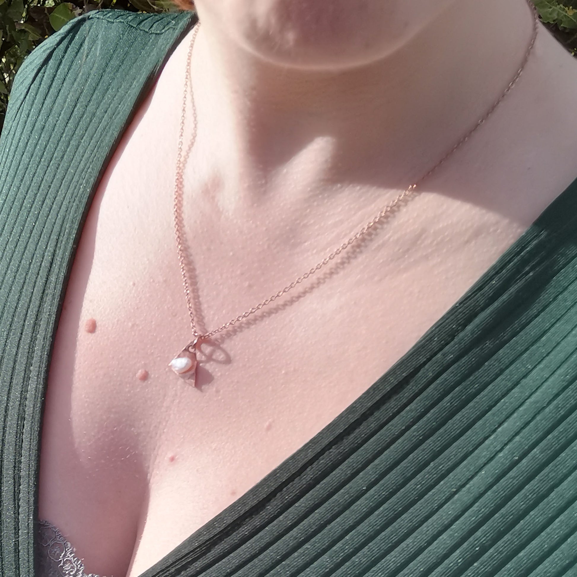 Copper rose gold necklace worn on