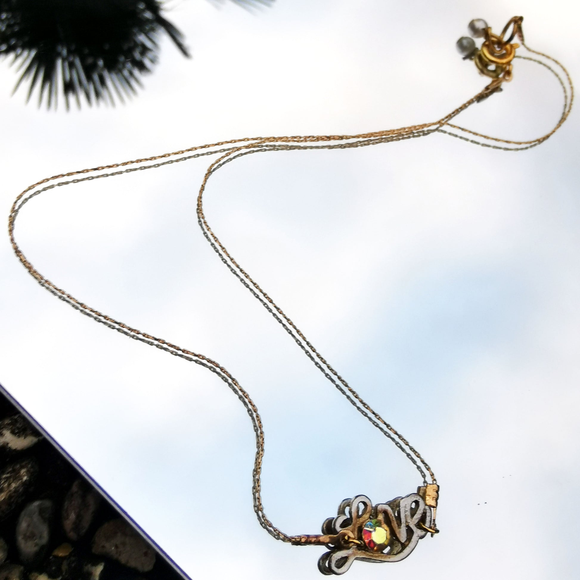 Love choker necklace photographed in mirror