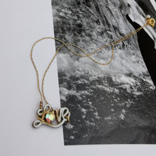 Load image into Gallery viewer, Love choker necklace photographed on book 
