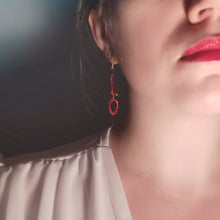 Load image into Gallery viewer, Love earrings red worn on
