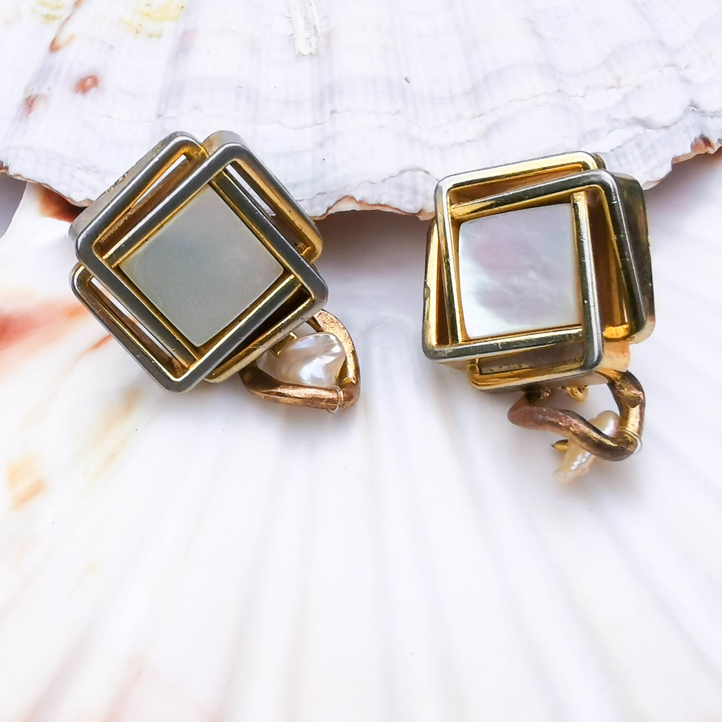 Large studs with small dangle detail