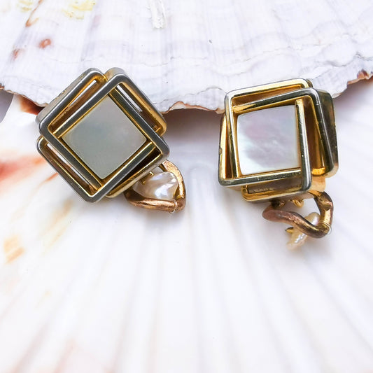 Large studs with small dangle detail