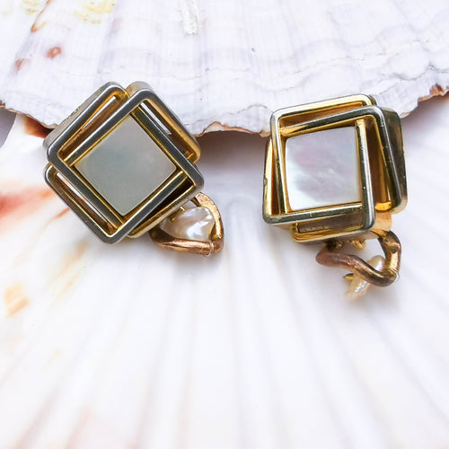 Large studs with small dangle detail