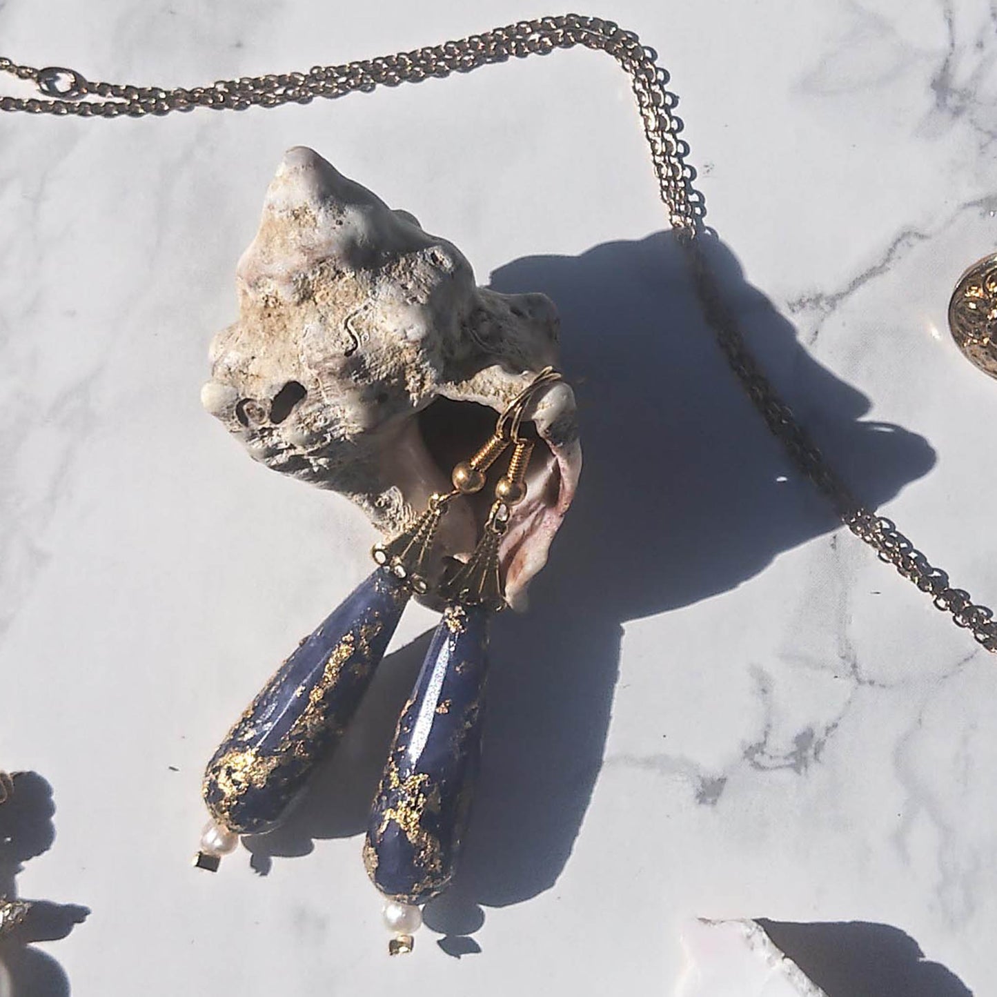 Gold foil freshwater pearl and  dark blue Jade earrings 