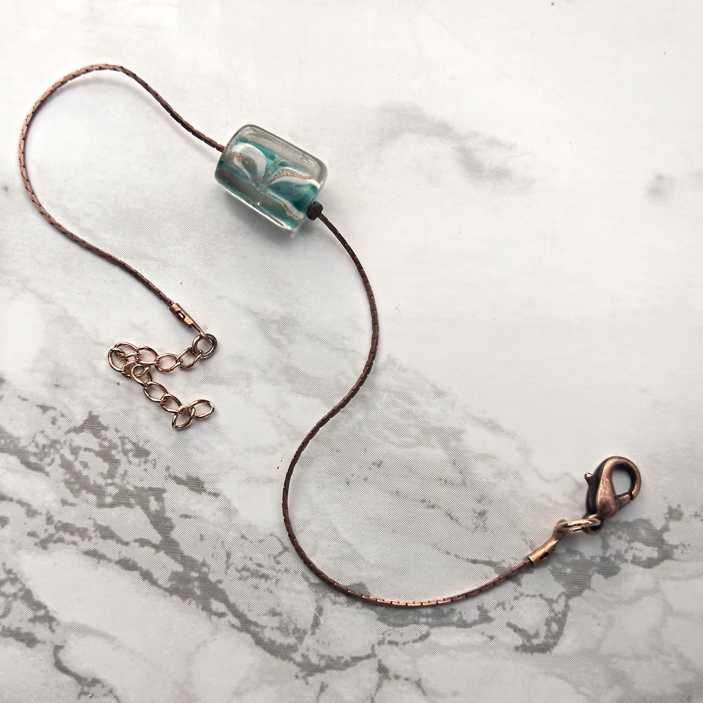 Camifolla Murano Glass copper on marble