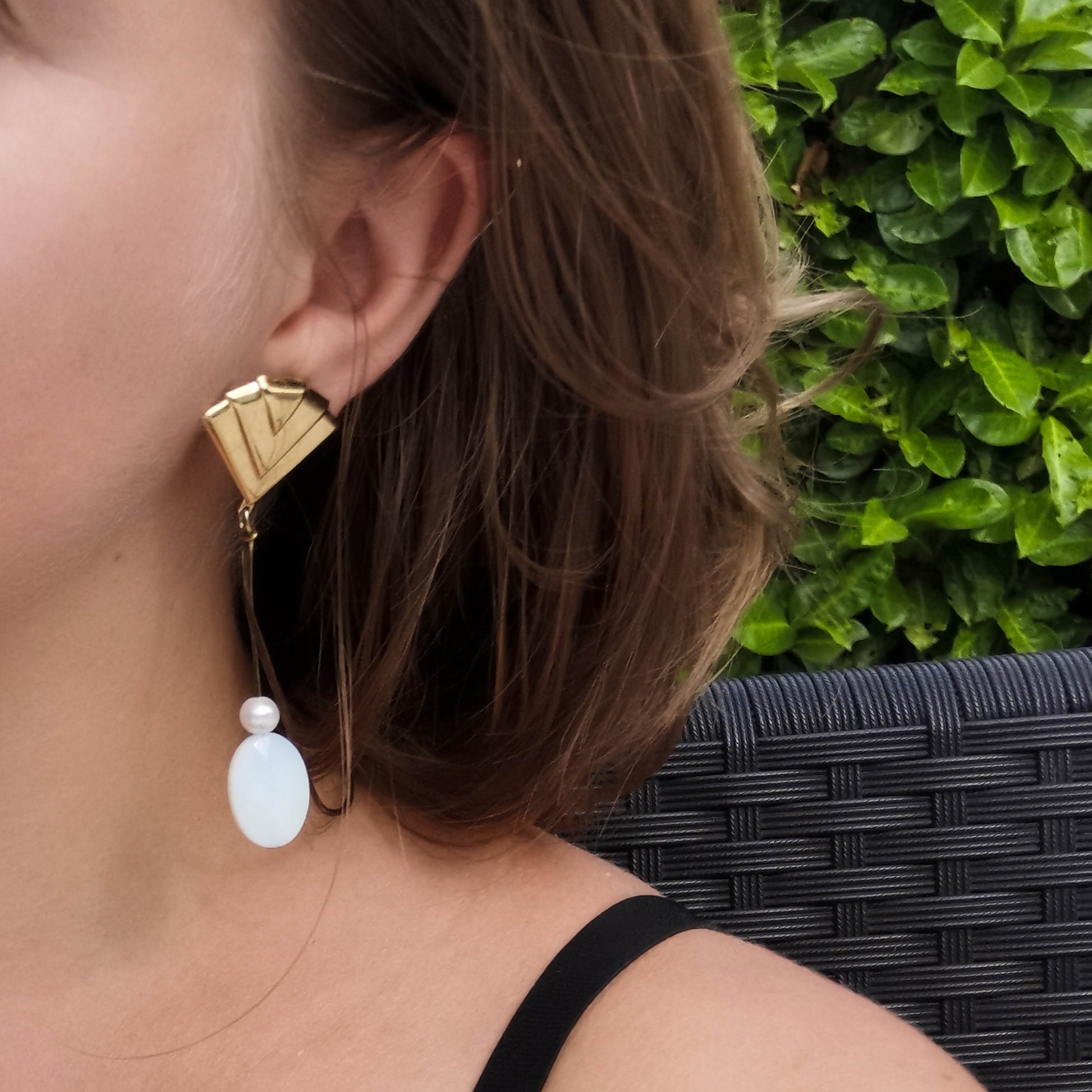 Fan studdded earring with opal and boehem pearl drop on pin worn on detail