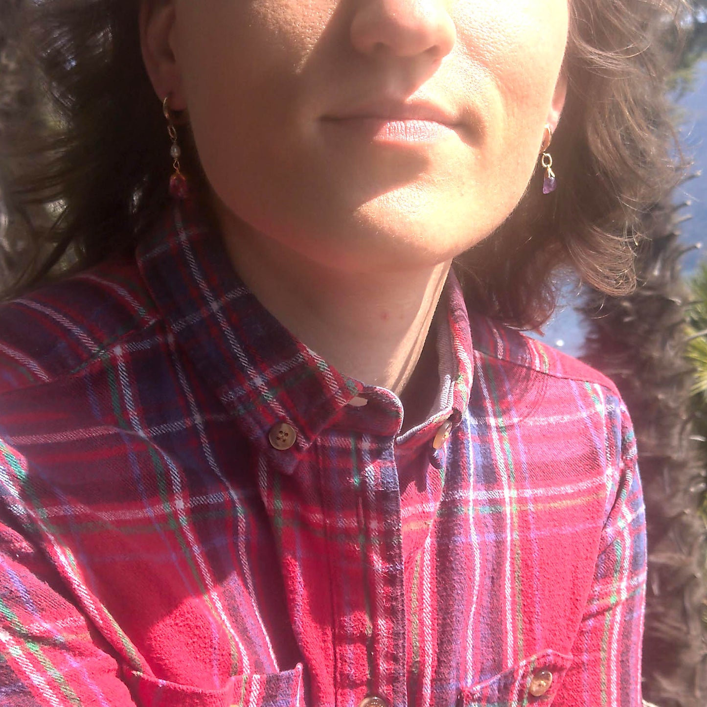 Mixmatch and asymmetric amethyst freshwater pearl earrings as worn on together